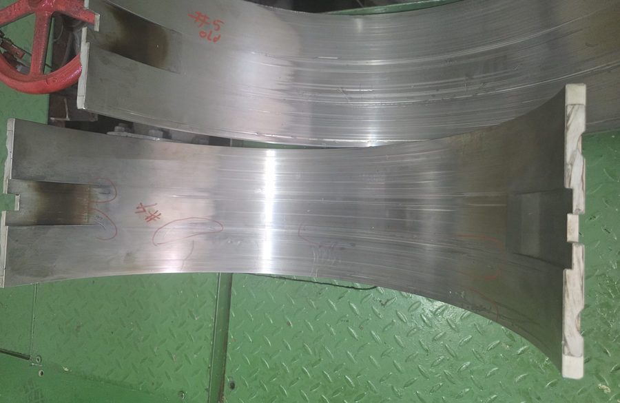 Bearing shells laid out for inspection during an engine overhaul